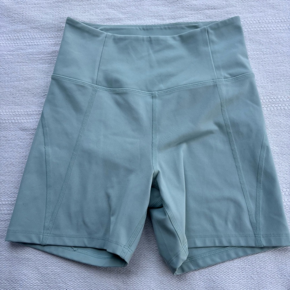 Girlfriend collective teal biker shorts size small